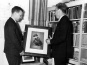 Henry Hawthorn unpacking paintings for the Museum of Anthropology, 1948